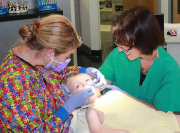 Pediatric Dentist - Dr. Pamela R. Shaw with patient
